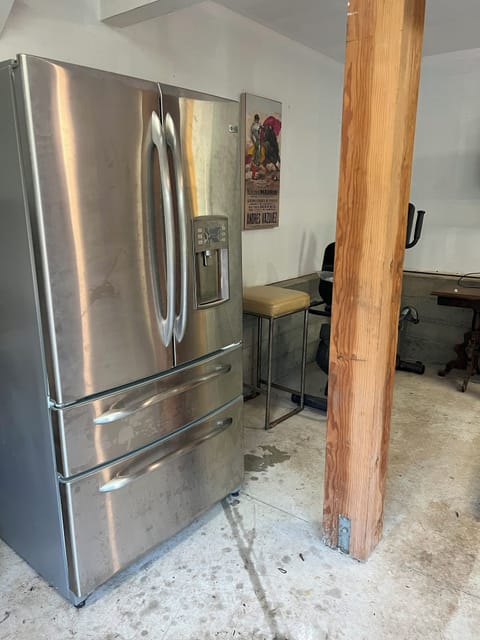 Full sized fridge/freezer downstairs.