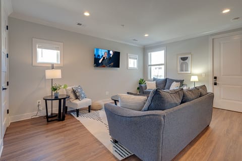 1st Unit: Modern Living Space featuring designer furnishings and a flat-screen SMART TV.