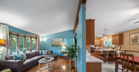 Living room flows into dining space.