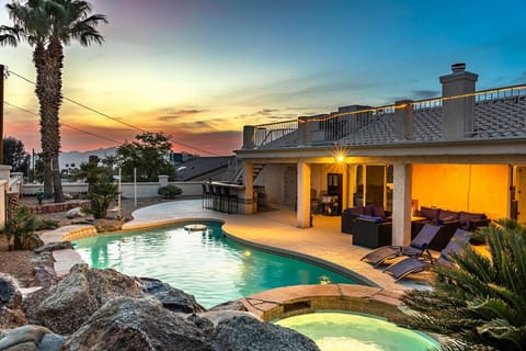 Escape to paradise in our stunning oasis, complete with a sparkling pool, relaxing spa, and cozy fire pit.