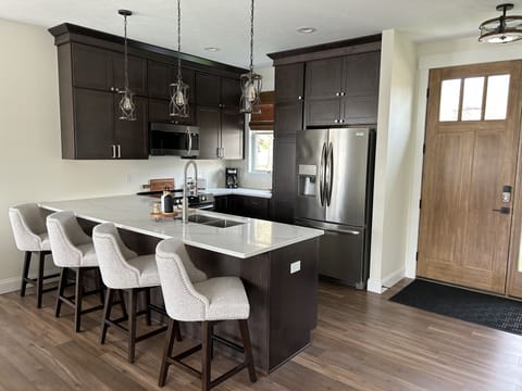 Front door (facing Elm St)  & kitchen area