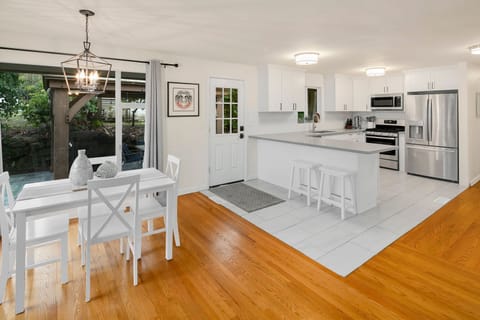 Enjoy meals together in this airy space with clean lines and plenty of natural light