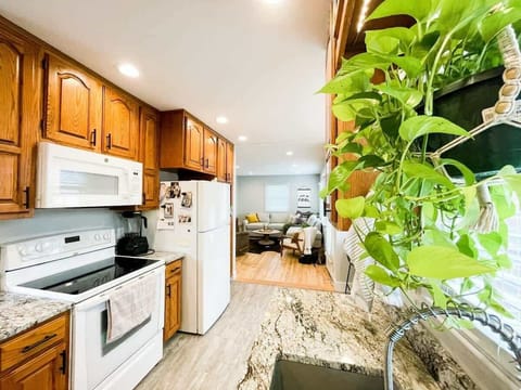Kitchen is right off the living room and will fill it up with good smellin' food!