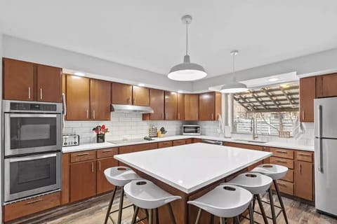 Two full size refrigerators and a built in beverage cooler available for guests.