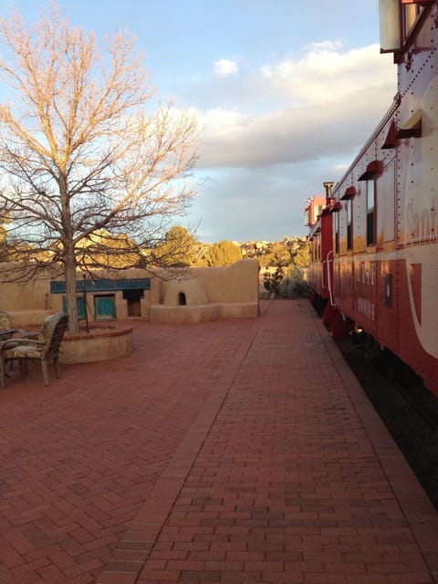 Patio with Cabooses on Rail track