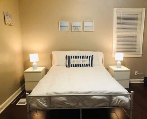 Relax in serenity in the "My Happy Place" beach-themed room with 32" Roku TV!