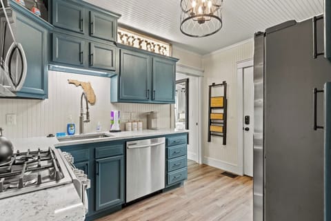 Full kitchen with stainless appliances including dishwasher 