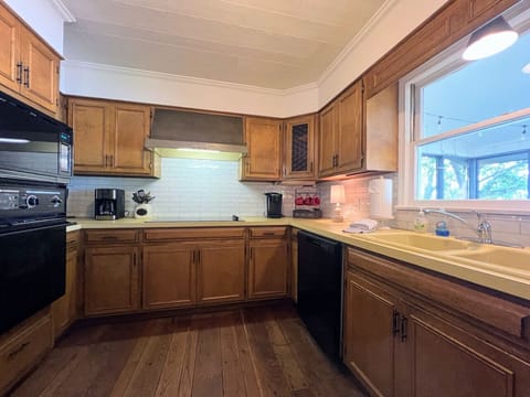 Modern kitchen with retro vibes overlooking Weiss Lake