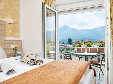 Komfortzimmer mit Seeblick - Hotel-pension Melcher Bed and Breakfast in Villach