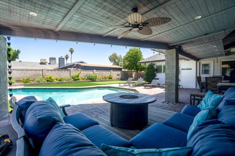 Welcome to our cozy back yard complete with plenty of comfortable seating and a sparkling heated pool!