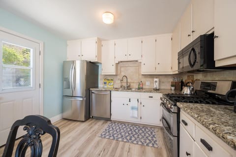 Full fridge with ice and water dispenser 

