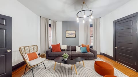 Living Room: In our living room there is a big comfy sofa for up to 4 people, an extra chair, a coffee table, and two small round chairs.