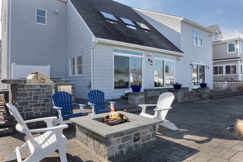 Fantastic outdoor space with huge patio on the canal.  Outdoor gas fire pit.