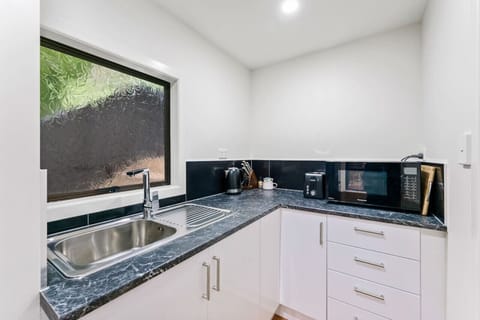 Although the kitchenette is compact, it has everything you need to self-cater.