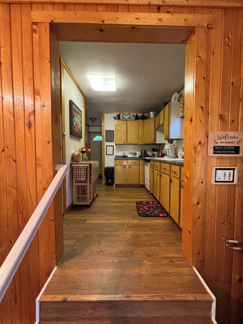 3 stairs up to the kitchen, bath & bedrooms.