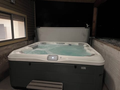 New covered patio and 8+ person hot tub!