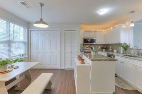 You'll love this fully stocked kitchen with a washer & dryer unit.