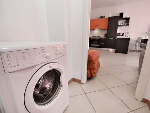 Laundry Room, Clothes Dryer, Washing Machine, Laundry, Home Appliance, Interior Design, Floor, Major Appliance, Gas, Flooring