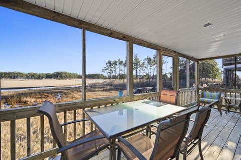 Relax on the spacious Screened Porch and watch the Herons & Egrets fish for their morning meal.