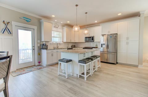 Kitchen island has seating for four