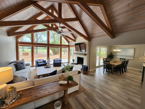 Gorgeous open living, kitchen & dining rooms. Relax on the large sofa & 2 chairs