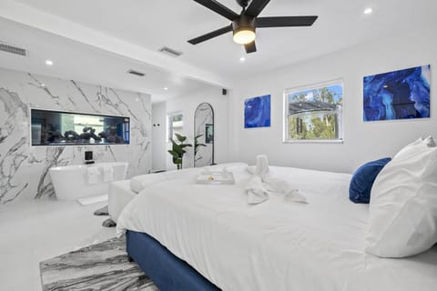 Enjoy a relaxing bathtub, that is under a 300 Gallon Salt water fish tank