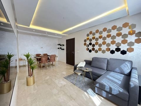 The comfortable couch in the relaxing living room is a haven of coziness and relaxation.