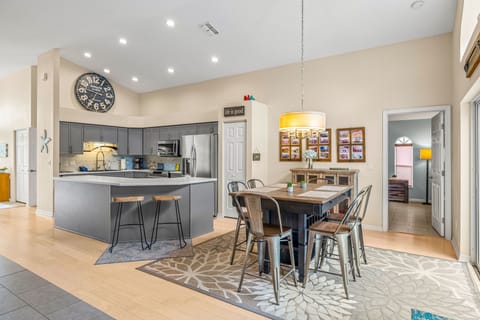 Stainless steel appliances and seating for 10 (with 4 soft stools provided)