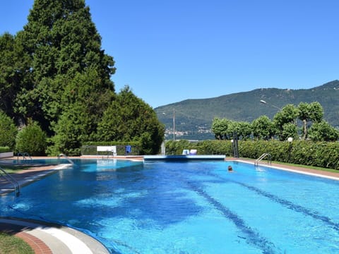 Water, Plant, Tree, Blue, Swimming Pool, Shade, Grass, Sky, Outdoor Furniture, Leisure
