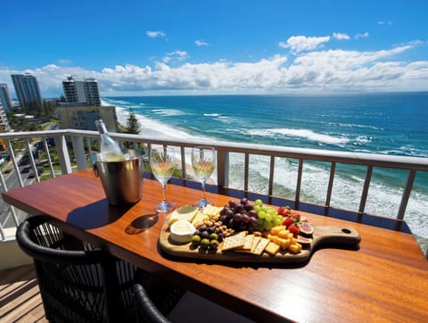 Oceanfront balcony dining, ideal for drinks or grazing platters