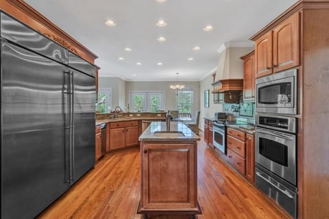 Spacious open-concept kitchen with high-end appliances and a generous island