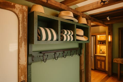 Grab a striped beach towel and a straw hat before heading out for the day.