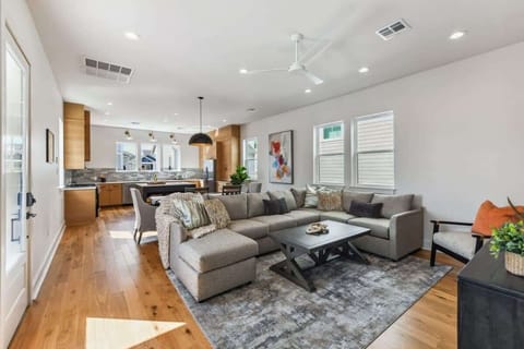 Spacious living room with sectional & smart TV