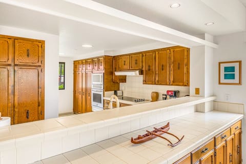 Kitchen flows into living area 
