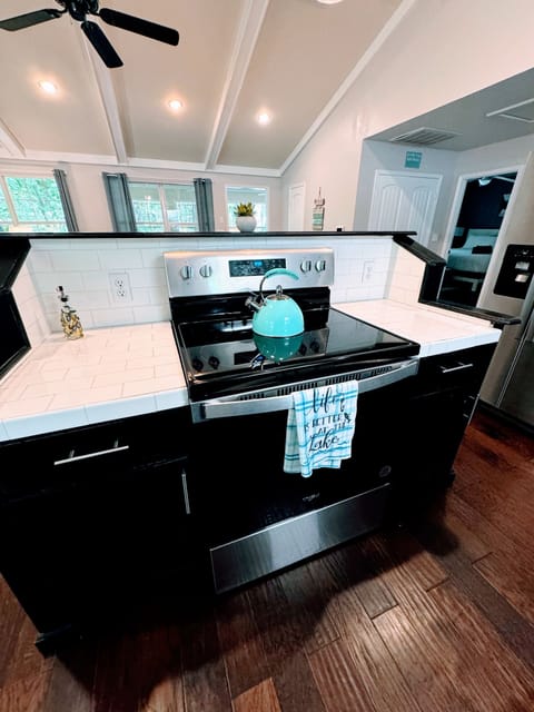 Glass top stove with air fryers part of the oven.