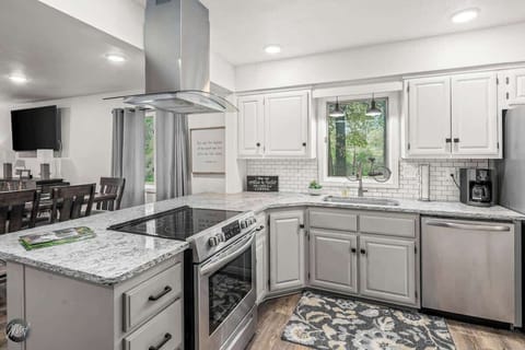 Bright, airy kitchen opens into dining space – perfect for cooking up local market finds & family meals 👩‍🍳🧳