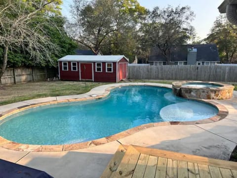 Luxury pool with hot tub functional year round