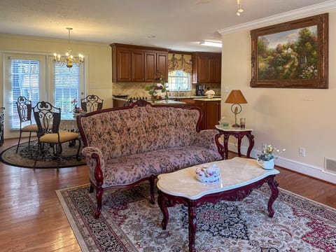 Living room with breakfast take at back