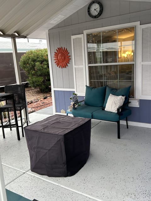 Outdoor propane fireplace and BBQ grill, comfy seating and table for 2