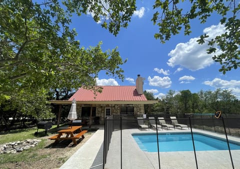 Exterior view of house and swimming pool