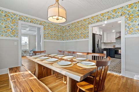 Sugar wood dining table for 10!
A high chair is available.