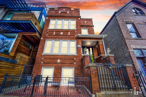 Two well appointed stone lion statues serve as a beacon to travelers and visitors upon arrival