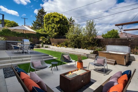 5 separate seating areas outside at this fabulous property provide everyone space.
