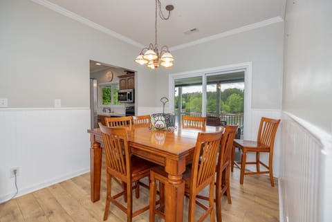 The dining table has enough seating for six people.