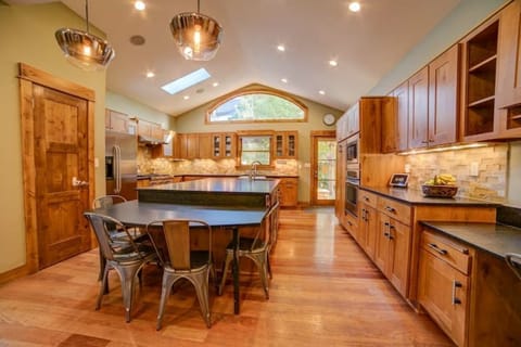 Deluxe kitchen with huge island. 