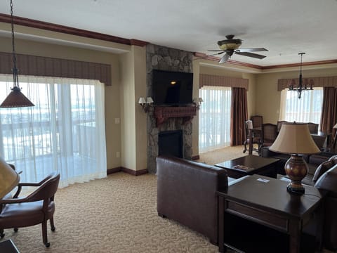 Spacious Great Room with fireplace, wrap-around deck