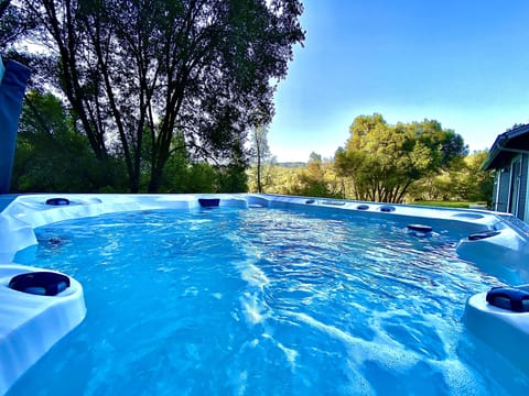 Soak in the Mountain Views in the large Spa/Hot Tub