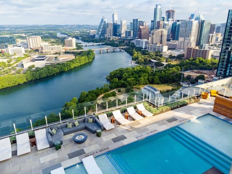 Rooftop pool with captivating Lady Bird Lake scenery.