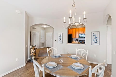 The dining area provides a cozy and inviting space for guests to gather and enjoy delicious meals together, fostering memorable moments and lively.