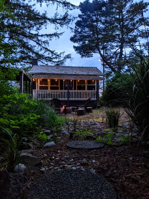 The back of the cottage at dusk.